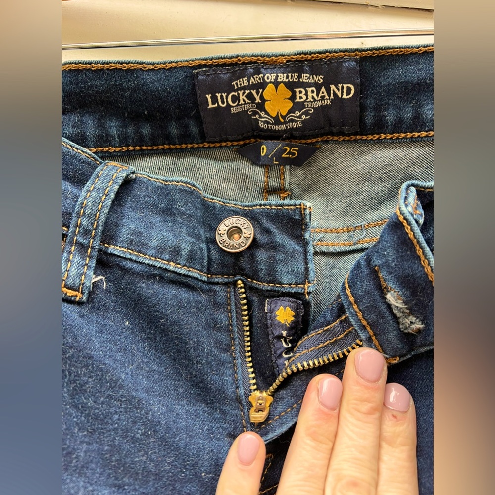 Lightly worn lucky brand “Charlie skinny” soft dark jeans, 0/25 long